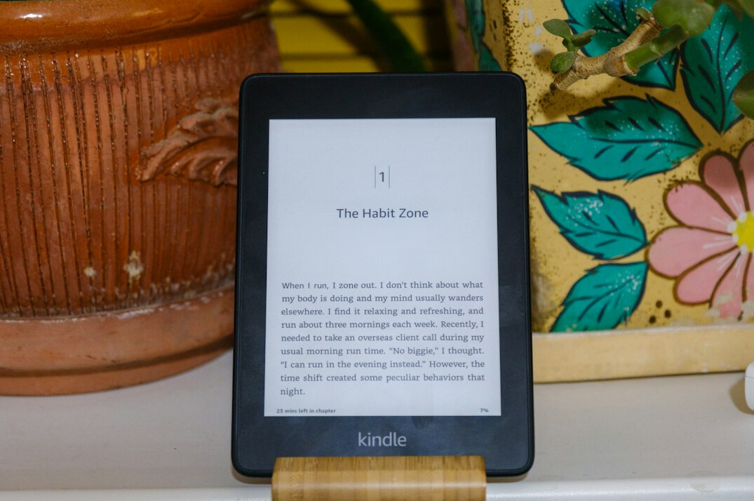 Tablet showing a digital magazine on a desk with coffee